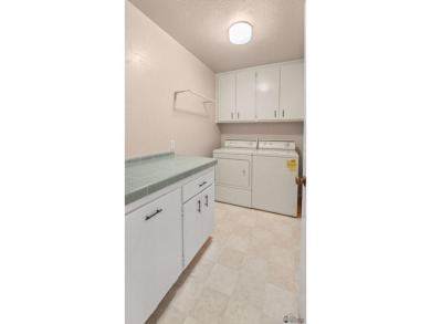 Ease of living in this condo with views of the beautiful Yuma on Yuma Golf and Country Club in Arizona - for sale on GolfHomes.com, golf home, golf lot