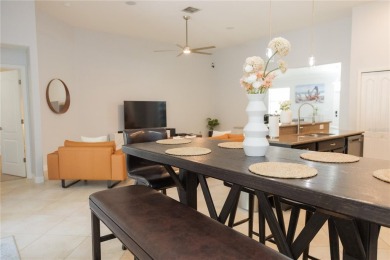 Golf, Gather, and Get Away, Right at Home in ChampionsGate on The Oasis Club at Champions Gate in Florida - for sale on GolfHomes.com, golf home, golf lot