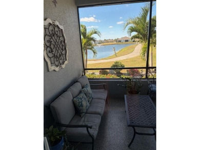 This fabulous and updated villa on the 10th hole overlooking the on Kings Gate Golf Club in Florida - for sale on GolfHomes.com, golf home, golf lot