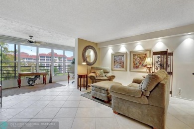 QUIET COZY RARELY AVAILABLE 2/2 KING OVERSIZED PENTHOUSE W/ENCL on Palm-Aire Country Club and Resort - The Oaks in Florida - for sale on GolfHomes.com, golf home, golf lot