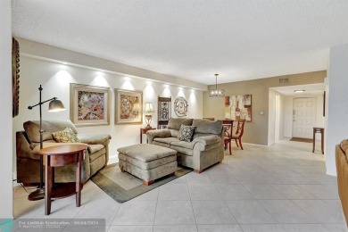 QUIET COZY RARELY AVAILABLE 2/2 KING OVERSIZED PENTHOUSE W/ENCL on Palm-Aire Country Club and Resort - The Oaks in Florida - for sale on GolfHomes.com, golf home, golf lot