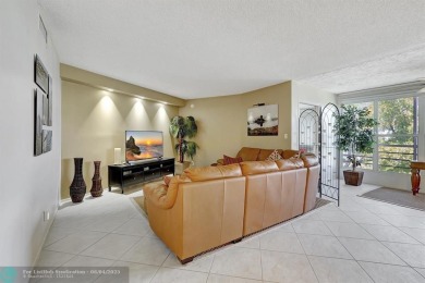 QUIET COZY RARELY AVAILABLE 2/2 KING OVERSIZED PENTHOUSE W/ENCL on Palm-Aire Country Club and Resort - The Oaks in Florida - for sale on GolfHomes.com, golf home, golf lot