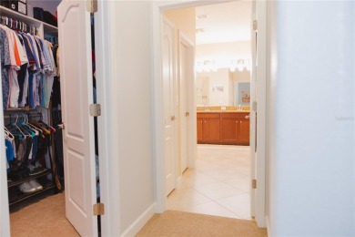 Golf, Gather, and Get Away, Right at Home in ChampionsGate on The Oasis Club at Champions Gate in Florida - for sale on GolfHomes.com, golf home, golf lot