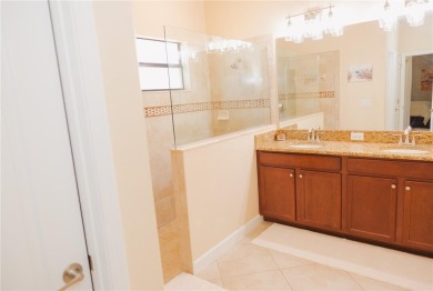 Golf, Gather, and Get Away, Right at Home in ChampionsGate on The Oasis Club at Champions Gate in Florida - for sale on GolfHomes.com, golf home, golf lot
