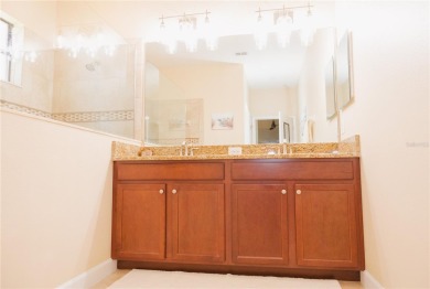 Golf, Gather, and Get Away, Right at Home in ChampionsGate on The Oasis Club at Champions Gate in Florida - for sale on GolfHomes.com, golf home, golf lot