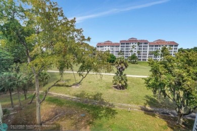 QUIET COZY RARELY AVAILABLE 2/2 KING OVERSIZED PENTHOUSE W/ENCL on Palm-Aire Country Club and Resort - The Oaks in Florida - for sale on GolfHomes.com, golf home, golf lot