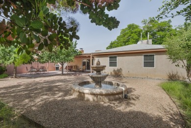 The quintessential mid-century modern home in North Campus! on North Course - University of New Mexico  in New Mexico - for sale on GolfHomes.com, golf home, golf lot