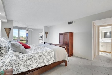 QUIET COZY RARELY AVAILABLE 2/2 KING OVERSIZED PENTHOUSE W/ENCL on Palm-Aire Country Club and Resort - The Oaks in Florida - for sale on GolfHomes.com, golf home, golf lot