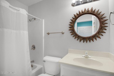 Nestled in a private setting at the end of a cul-de-sac, this on The Country Club of the Crystal Coast in North Carolina - for sale on GolfHomes.com, golf home, golf lot