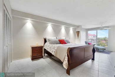 QUIET COZY RARELY AVAILABLE 2/2 KING OVERSIZED PENTHOUSE W/ENCL on Palm-Aire Country Club and Resort - The Oaks in Florida - for sale on GolfHomes.com, golf home, golf lot
