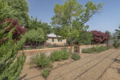 The quintessential mid-century modern home in North Campus! on North Course - University of New Mexico  in New Mexico - for sale on GolfHomes.com, golf home, golf lot
