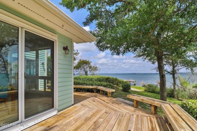 Nestled in a private setting at the end of a cul-de-sac, this on The Country Club of the Crystal Coast in North Carolina - for sale on GolfHomes.com, golf home, golf lot