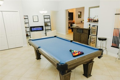 Golf, Gather, and Get Away, Right at Home in ChampionsGate on The Oasis Club at Champions Gate in Florida - for sale on GolfHomes.com, golf home, golf lot