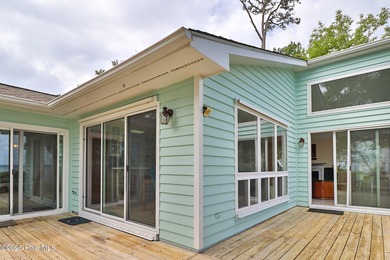 Nestled in a private setting at the end of a cul-de-sac, this on The Country Club of the Crystal Coast in North Carolina - for sale on GolfHomes.com, golf home, golf lot