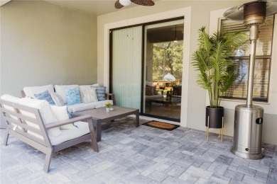 Golf, Gather, and Get Away, Right at Home in ChampionsGate on The Oasis Club at Champions Gate in Florida - for sale on GolfHomes.com, golf home, golf lot