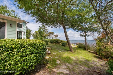 Nestled in a private setting at the end of a cul-de-sac, this on The Country Club of the Crystal Coast in North Carolina - for sale on GolfHomes.com, golf home, golf lot