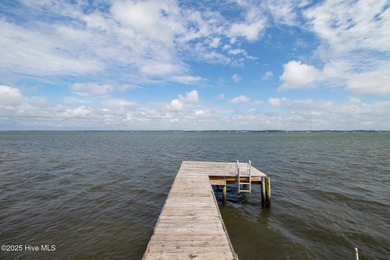 Nestled in a private setting at the end of a cul-de-sac, this on The Country Club of the Crystal Coast in North Carolina - for sale on GolfHomes.com, golf home, golf lot
