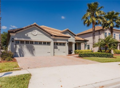 Golf, Gather, and Get Away, Right at Home in ChampionsGate on The Oasis Club at Champions Gate in Florida - for sale on GolfHomes.com, golf home, golf lot