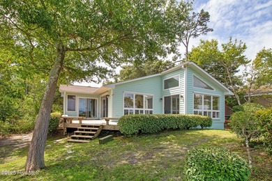 Nestled in a private setting at the end of a cul-de-sac, this on The Country Club of the Crystal Coast in North Carolina - for sale on GolfHomes.com, golf home, golf lot