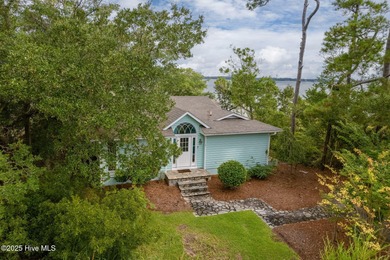 Nestled in a private setting at the end of a cul-de-sac, this on The Country Club of the Crystal Coast in North Carolina - for sale on GolfHomes.com, golf home, golf lot