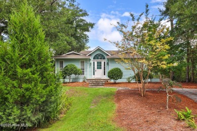 Nestled in a private setting at the end of a cul-de-sac, this on The Country Club of the Crystal Coast in North Carolina - for sale on GolfHomes.com, golf home, golf lot