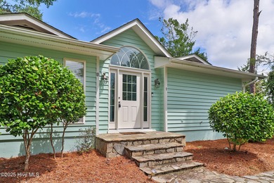 Nestled in a private setting at the end of a cul-de-sac, this on The Country Club of the Crystal Coast in North Carolina - for sale on GolfHomes.com, golf home, golf lot