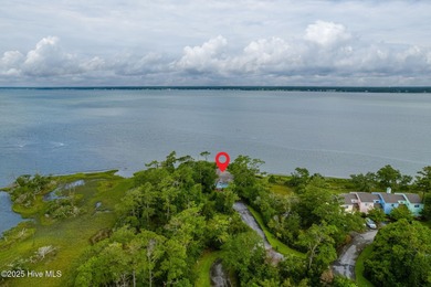 Nestled in a private setting at the end of a cul-de-sac, this on The Country Club of the Crystal Coast in North Carolina - for sale on GolfHomes.com, golf home, golf lot