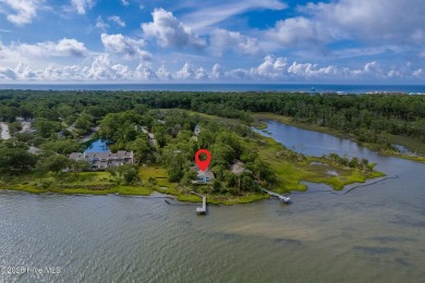 Nestled in a private setting at the end of a cul-de-sac, this on The Country Club of the Crystal Coast in North Carolina - for sale on GolfHomes.com, golf home, golf lot