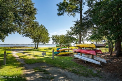 Nestled in a private setting at the end of a cul-de-sac, this on The Country Club of the Crystal Coast in North Carolina - for sale on GolfHomes.com, golf home, golf lot