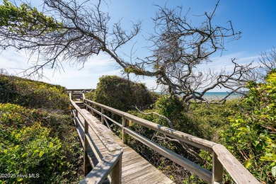 Nestled in a private setting at the end of a cul-de-sac, this on The Country Club of the Crystal Coast in North Carolina - for sale on GolfHomes.com, golf home, golf lot