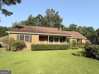 This well-maintained four-sided brick home features hardwood on Honey Creek Country Club in Georgia - for sale on GolfHomes.com, golf home, golf lot