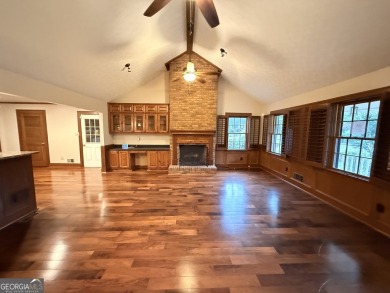This well-maintained four-sided brick home features hardwood on Honey Creek Country Club in Georgia - for sale on GolfHomes.com, golf home, golf lot