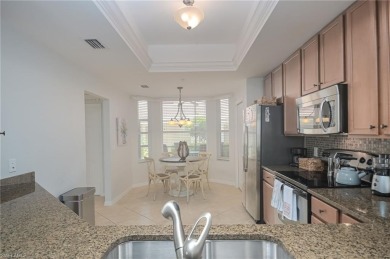 Highly Desirable and Rarely Available ABBEY MODEL END UNIT in on Heritage Bay Golf Course in Florida - for sale on GolfHomes.com, golf home, golf lot