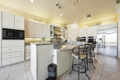 Stunning custom home built by Fox Brothers, sits on an elevated on Bermuda Dunes Country Club in California - for sale on GolfHomes.com, golf home, golf lot