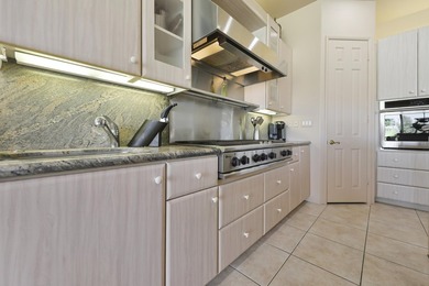 Stunning custom home built by Fox Brothers, sits on an elevated on Bermuda Dunes Country Club in California - for sale on GolfHomes.com, golf home, golf lot