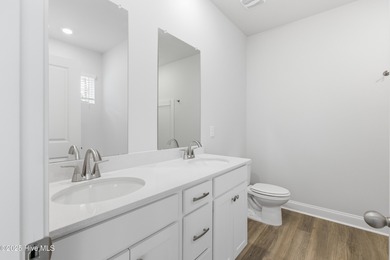 The Kent is a stunning open-concept home designed for effortless on Harbour Point Golf Club in North Carolina - for sale on GolfHomes.com, golf home, golf lot