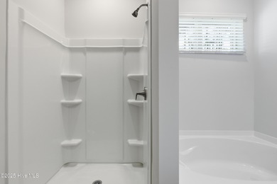 The Kent is a stunning open-concept home designed for effortless on Harbour Point Golf Club in North Carolina - for sale on GolfHomes.com, golf home, golf lot