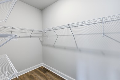 The Kent is a stunning open-concept home designed for effortless on Harbour Point Golf Club in North Carolina - for sale on GolfHomes.com, golf home, golf lot