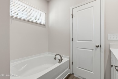 The Kent is a stunning open-concept home designed for effortless on Harbour Point Golf Club in North Carolina - for sale on GolfHomes.com, golf home, golf lot