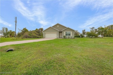 Welcome to this beautifully maintained 4-bedroom, 2-bathroom on Kingsway Country Club in Florida - for sale on GolfHomes.com, golf home, golf lot