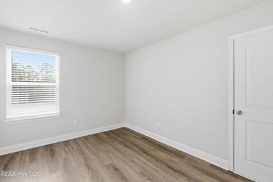 The Kent is a stunning open-concept home designed for effortless on Harbour Point Golf Club in North Carolina - for sale on GolfHomes.com, golf home, golf lot