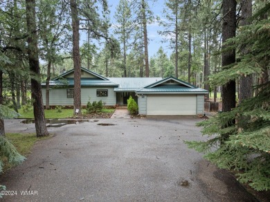 **Welcome to Your Dream Getaway Cabin**
Nestled in the heart of on Pinetop Lakes Country Club in Arizona - for sale on GolfHomes.com, golf home, golf lot