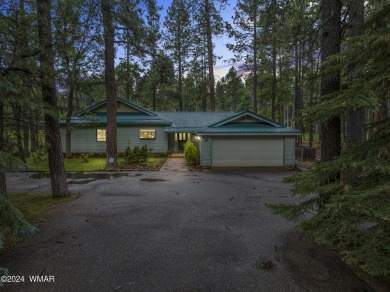 **Welcome to Your Dream Getaway Cabin**
Nestled in the heart of on Pinetop Lakes Country Club in Arizona - for sale on GolfHomes.com, golf home, golf lot