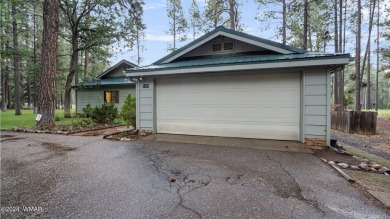 **Welcome to Your Dream Getaway Cabin**
Nestled in the heart of on Pinetop Lakes Country Club in Arizona - for sale on GolfHomes.com, golf home, golf lot