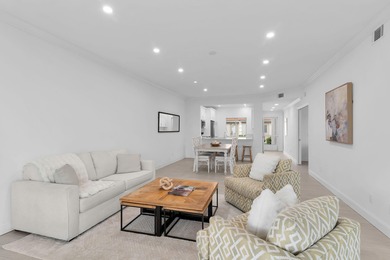 Enjoy refined living in this fully renovated end-unit residence on Glen Eagle Golf and Country Club in Florida - for sale on GolfHomes.com, golf home, golf lot