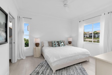 Enjoy refined living in this fully renovated end-unit residence on Glen Eagle Golf and Country Club in Florida - for sale on GolfHomes.com, golf home, golf lot