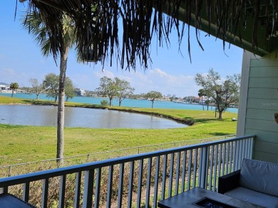 Experience the ultimate tropical lifestyle in this on Treasure Bay Golf and Tennis in Florida - for sale on GolfHomes.com, golf home, golf lot