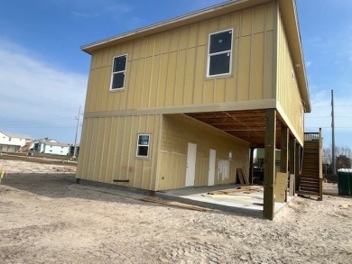 This New Construction home is located within walking distance to on Palmilla Beach Golf Club in Texas - for sale on GolfHomes.com, golf home, golf lot