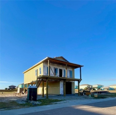 This New Construction home is located within walking distance to on Palmilla Beach Golf Club in Texas - for sale on GolfHomes.com, golf home, golf lot