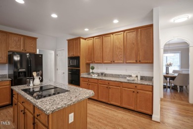 Live luxuriously in the heart of Holly Springs' sought-after on Devils Ridge Golf Club in North Carolina - for sale on GolfHomes.com, golf home, golf lot